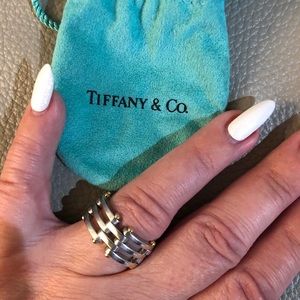 Silver Tiffany & Co ring with gold accents